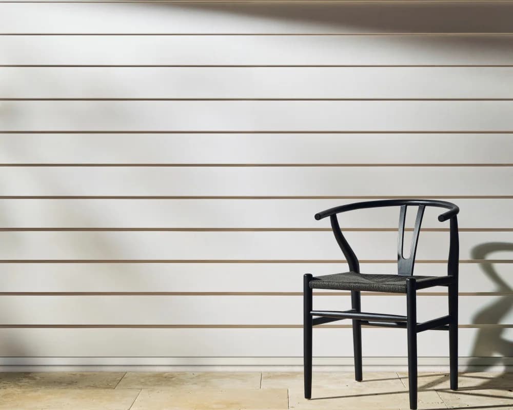 Create a dramatic transformation by cladding over your tired brick façade